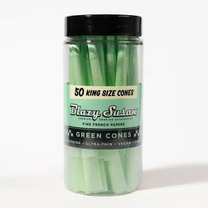Green cones in plastic travel jar 