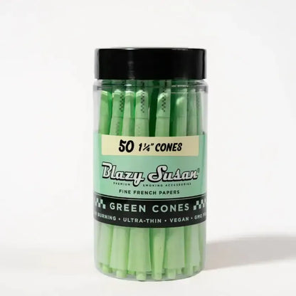 Green cones in plastic travel jar 