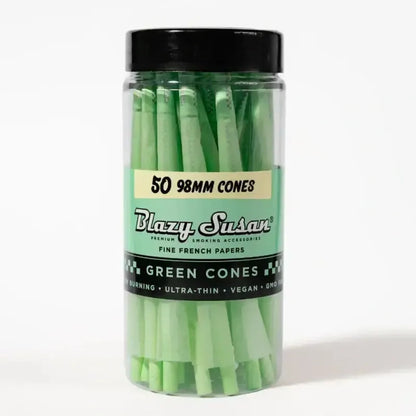Green cones in plastic travel jar 